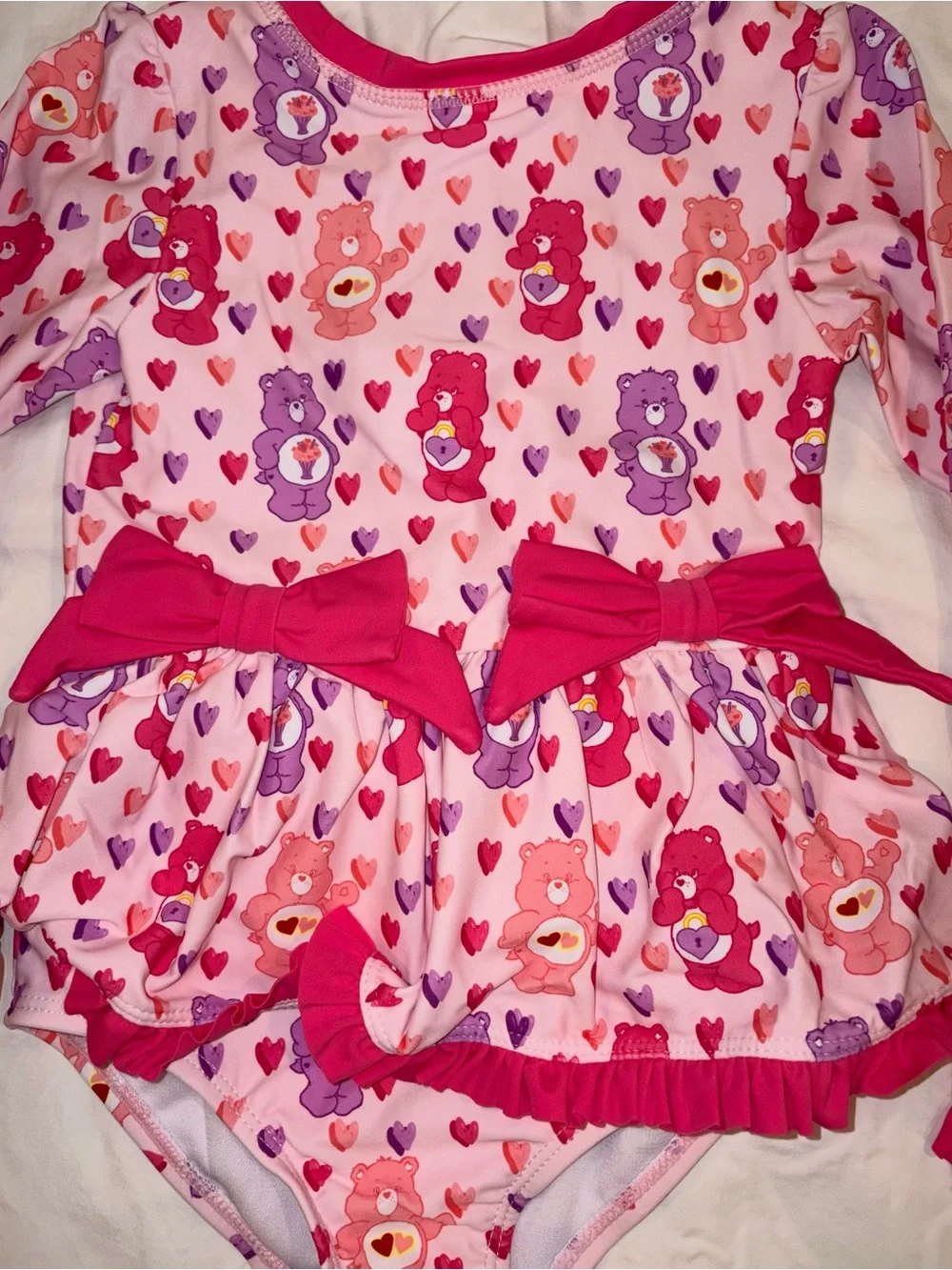 Ruffle Butts X Care Bears 1 piece swimsuit/rashguard sz 4T NWT